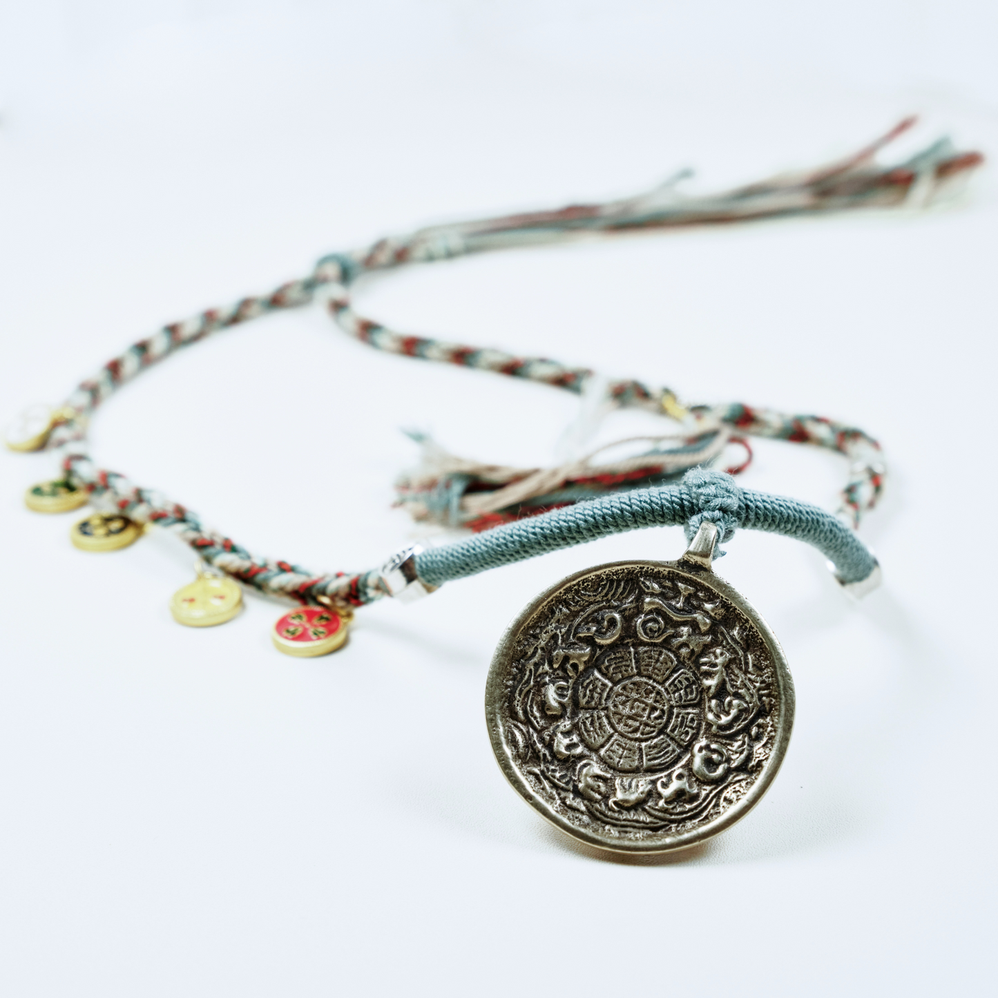 九宫牌财神Tibetan Nine-Palace Fortune Amulet – Cotton Cord Necklace with Brass Wealth Guardian