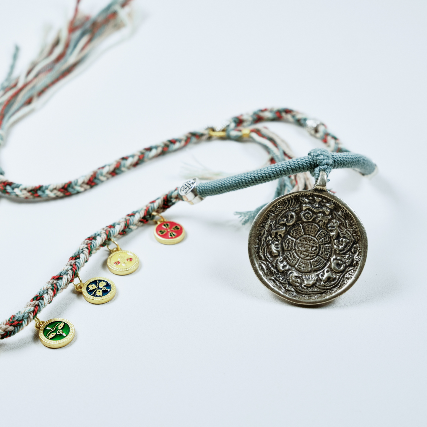 九宫牌财神Tibetan Nine-Palace Fortune Amulet – Cotton Cord Necklace with Brass Wealth Guardian