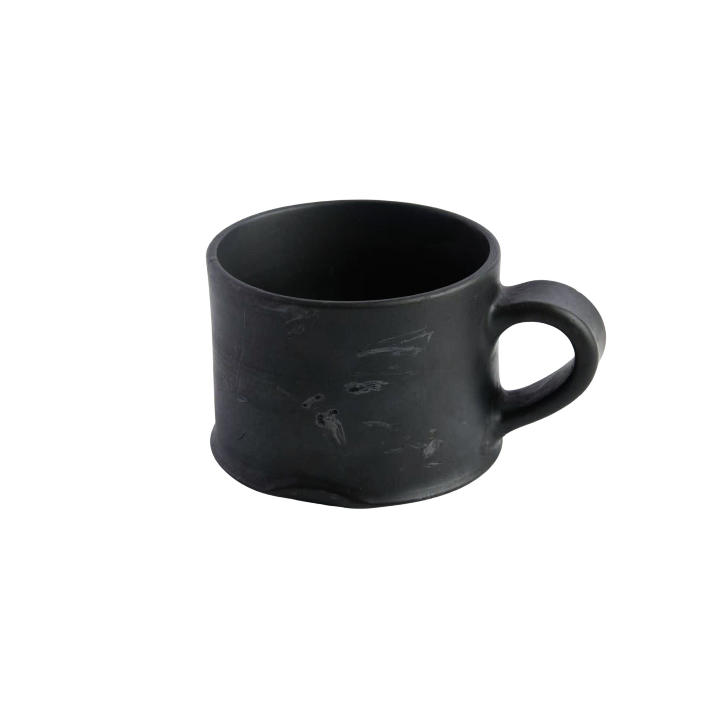Qonga Hand-Pinched Black Pottery Coffee Cup  Everyday calm shaped by hand