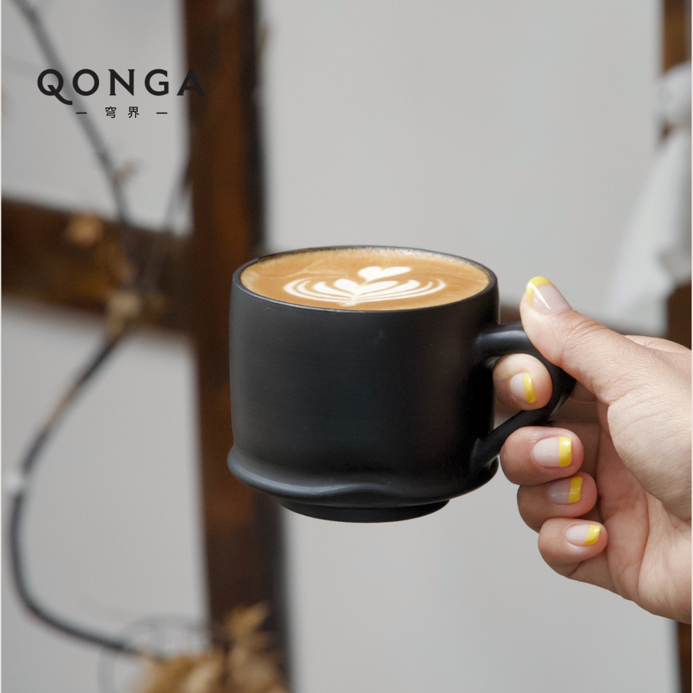Qonga Hand-Pinched Black Pottery Coffee Cup  Everyday calm shaped by hand